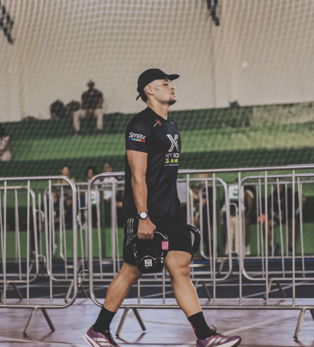 Coach acompanhando a arena de competição